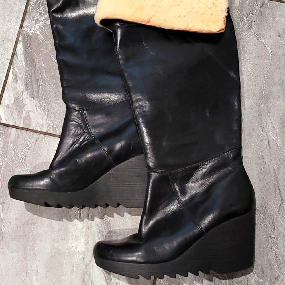 UGG knee high black leather shearling platform boots